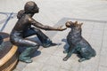 Girl With Her Dog Statue in Budapest Royalty Free Stock Photo