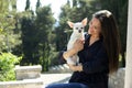 Girl and her dog white chihuahua Royalty Free Stock Photo
