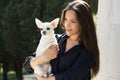 Girl and her dog white chihuahua Royalty Free Stock Photo