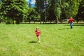 The girl and her father play with a kite. Royalty Free Stock Photo