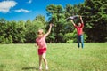 The girl and her father play with a kite. Royalty Free Stock Photo