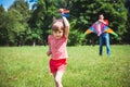 The girl and her father play with a kite. Royalty Free Stock Photo