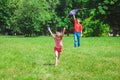 The girl and her father play with a kite. Royalty Free Stock Photo