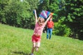 The girl and her father play with a kite. Royalty Free Stock Photo