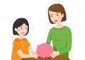 A girl with her mother holding a piggy bank Royalty Free Stock Photo