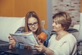 Girl and her mother study together before an exam Royalty Free Stock Photo