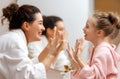 girl and her mother are washing hands Royalty Free Stock Photo