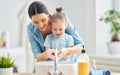 Girl and her mother are washing hands Royalty Free Stock Photo