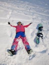 A girl with her snowboard and her first practice for snowboarding at Niseko illage, Sapporo , Japan Royalty Free Stock Photo