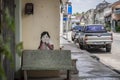 The girl is hiding behind a bench. Street art on the walls of houses in the old town of Takua Pa .Takua Pa Thailand Royalty Free Stock Photo