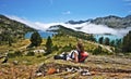 Girl hiker enjoying Panorama of Neouvielle mountain Massif Royalty Free Stock Photo