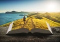 Girl hiker on the pages of book Royalty Free Stock Photo