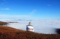 Girl hiker sitting on the rock mountain , relaxing and inspiring on the top of the himalayan mountain. Royalty Free Stock Photo