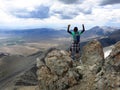 Girl hiker summit mountain top