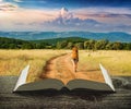 Girl hiker on a trail on the pages of book Royalty Free Stock Photo