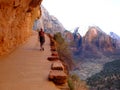 Girl Hiking By Cliffs in Zions National Park