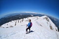 Girl hiking .Snow on the top of the Tahtali mountain , Turkey