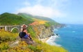 Girl on hiking trip enjoying beautiful summer mountains, coastal landscape, Royalty Free Stock Photo