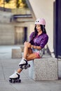 Girl hit the leg during roller skating Royalty Free Stock Photo