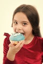 Girl hold glazed donut white background. Kid girl hungry for sweet donut. Donut become so popular. Sugar levels and Royalty Free Stock Photo