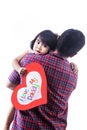 Girl hold love card hug by dad