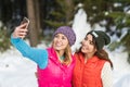 Girl Hold Smart Phone Camera Taking Selfie Photo Snow Forest Young Woman Couple Outdoor Winter Royalty Free Stock Photo