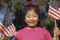 Girl holding the American flag