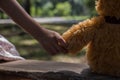 Girl holding a bear, swing bear summer Royalty Free Stock Photo