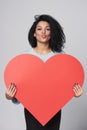 Girl holding big red heart shape Royalty Free Stock Photo