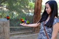 Girl holding birds