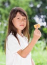 Girl holding biscuits