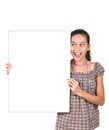 Girl holding a blank white card for text. Royalty Free Stock Photo