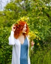 Girl holding a bouquet of wild flowers. Royalty Free Stock Photo