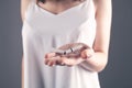 Girl holding break cigarettes in her hands