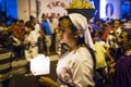 Girl holding a candle at night in a procession in the streets of the city of Leon in Nicaragua during the Easter celebrations