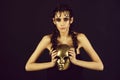 Girl holding carnival, golden, face mask Royalty Free Stock Photo
