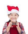 Girl holding christmas gift Royalty Free Stock Photo