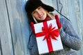 Girl holding Christmas gift Royalty Free Stock Photo