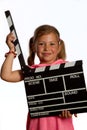 Girl holding a clapperboard