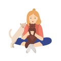 Girl holding, cuddling and stroking her cats. Young woman sitting cross-legged and playing with domestic animals. Pet