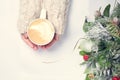 Girl holding cup of coffee with latte art. Leasure time concept.