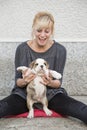 Girl holding Cute English Bulldog Puppies