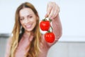 Girl holding fresh cherry tomato,healthy diet Royalty Free Stock Photo