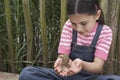 Girl Holding Frog