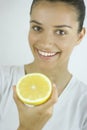 Girl holding grapefruit Royalty Free Stock Photo