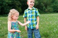 girl holding grasshopper, curiosity and education concept Royalty Free Stock Photo