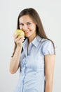 Girl holding a green apple Royalty Free Stock Photo