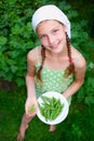 Girl holding a green Peas Royalty Free Stock Photo