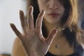 Girl holding hand on door glass Royalty Free Stock Photo