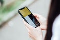 Girl holding iPhone showing Yandex taxi app on screen. Royalty Free Stock Photo